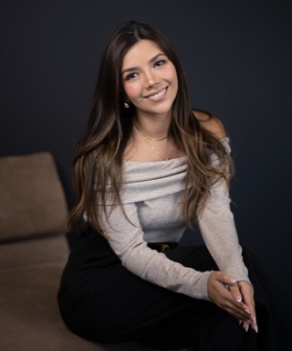 Alpha Team researcher smiling in studio portrait at our Los Angeles sessions
