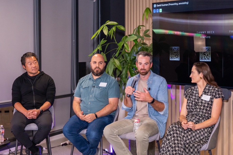 Four builders on stage during the Building in Public vs. Building in Stealth panel at Golden Hour 007 inside our Wilshire Boulevard headquarters